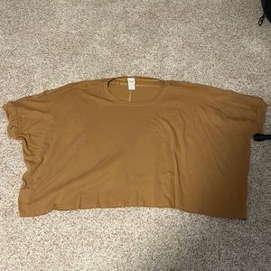 Oversized top. Super cute, but heavy material and wide for a size small!